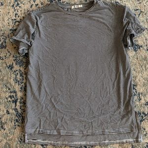 Francesca’s black and white stripped loose Tee